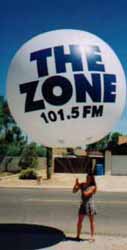 Helium advertising balloon with Radio Station logo
